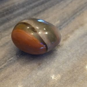 Polished Stone with Earthy Tones